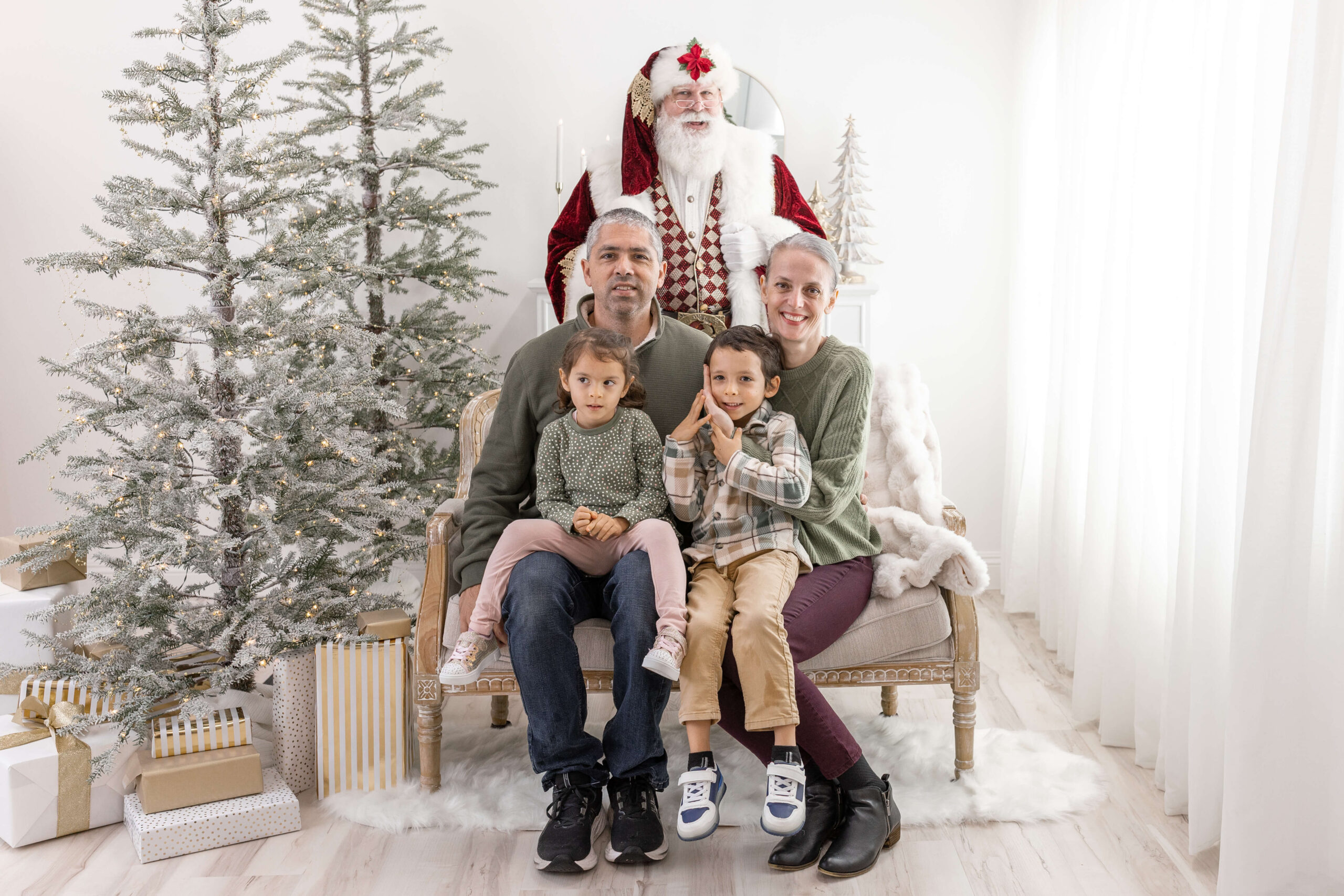 Family portrait with Santa Claus in Orange County