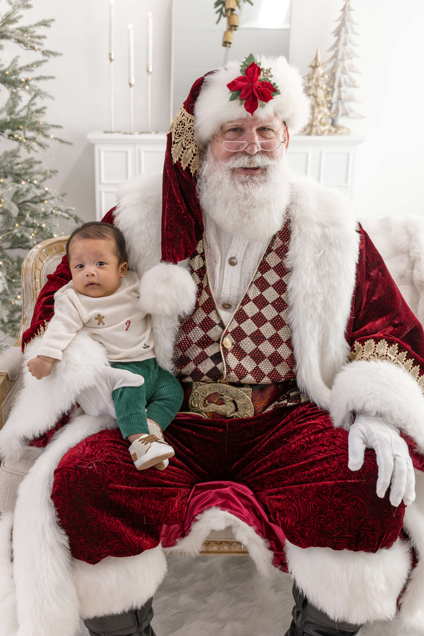 Santa with a newborn baby on his lap